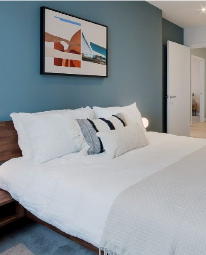 bedroom of one of the teo bedroom flats within west grove at elephant park