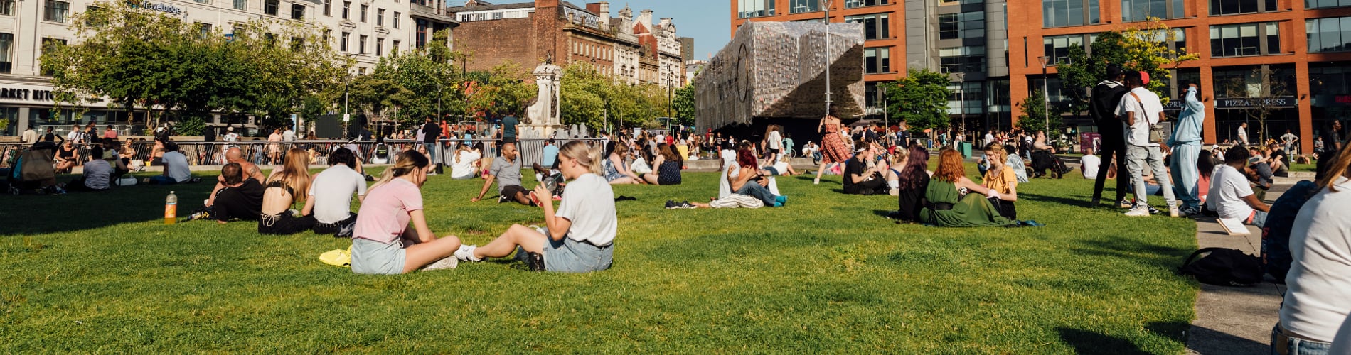 People outside at Potato Wharf Manchester